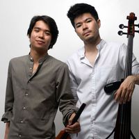 ARKAI Duo standing with instruments